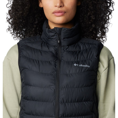 Top half of woman wearing Columbia Women's Powder Lite™ II Vest in black, zipped up