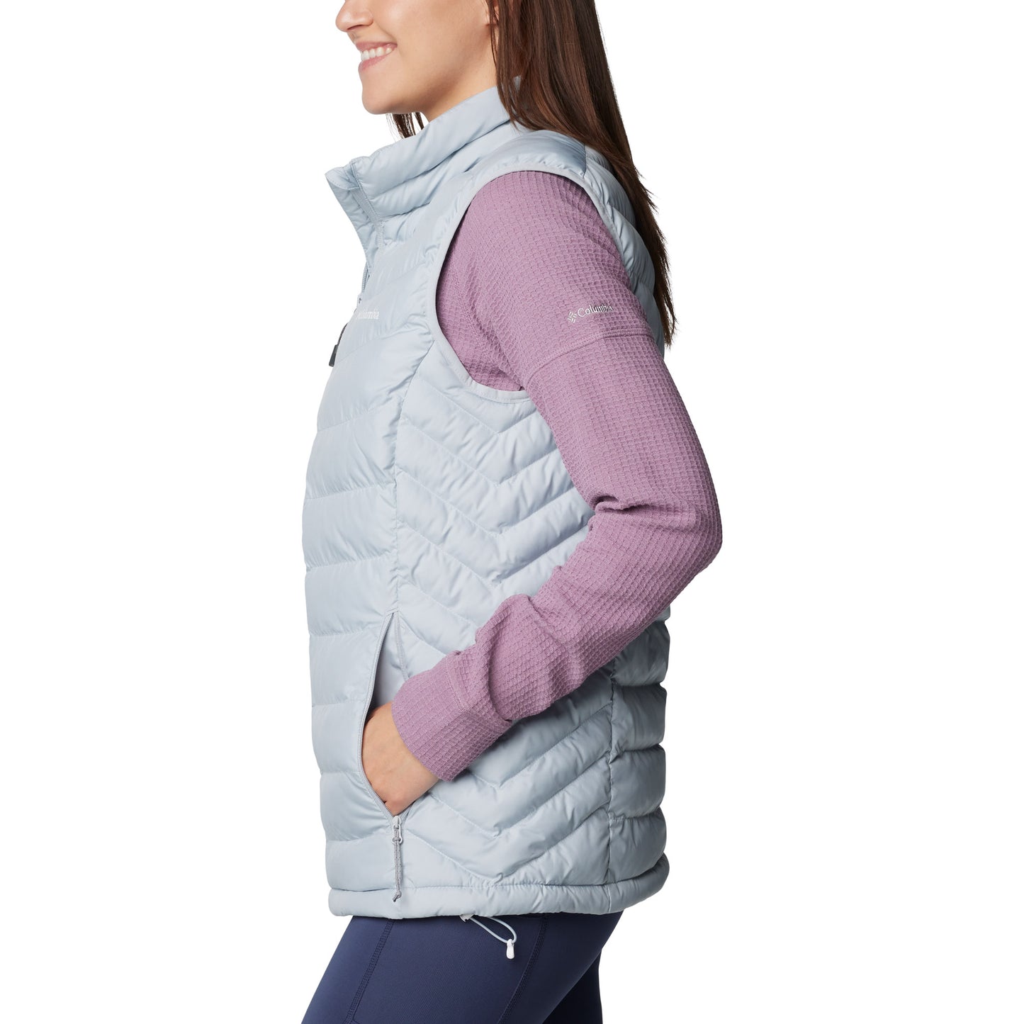 Woman wearing Columbia Women's Powder Lite™ II Vest in cirrus grey, side view