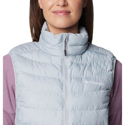 Top half of woman wearing Columbia Women's Powder Lite™ II Vest in cirrus grey, zipped up