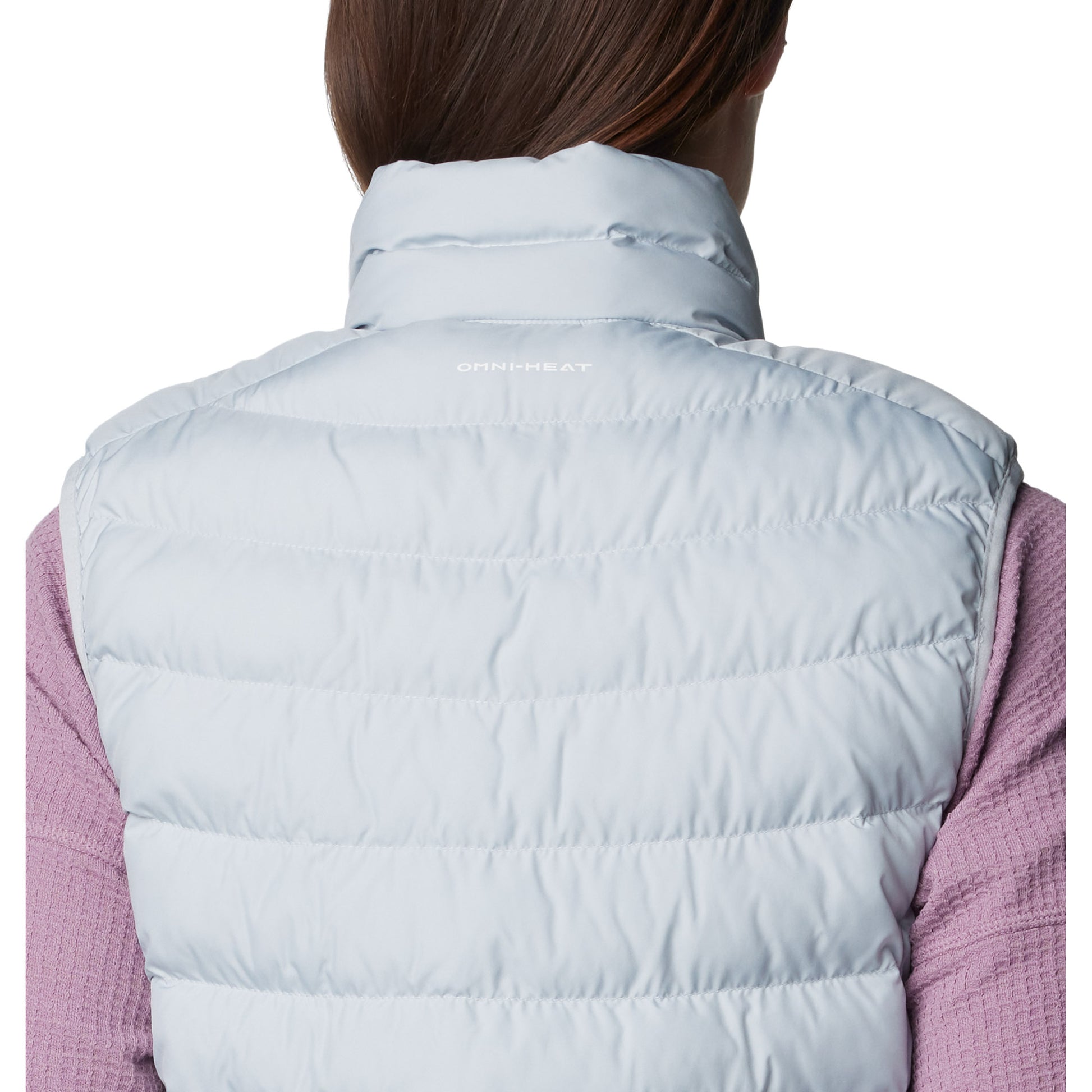 Top back half of woman wearing Columbia Women's Powder Lite™ II Vest in cirrus grey