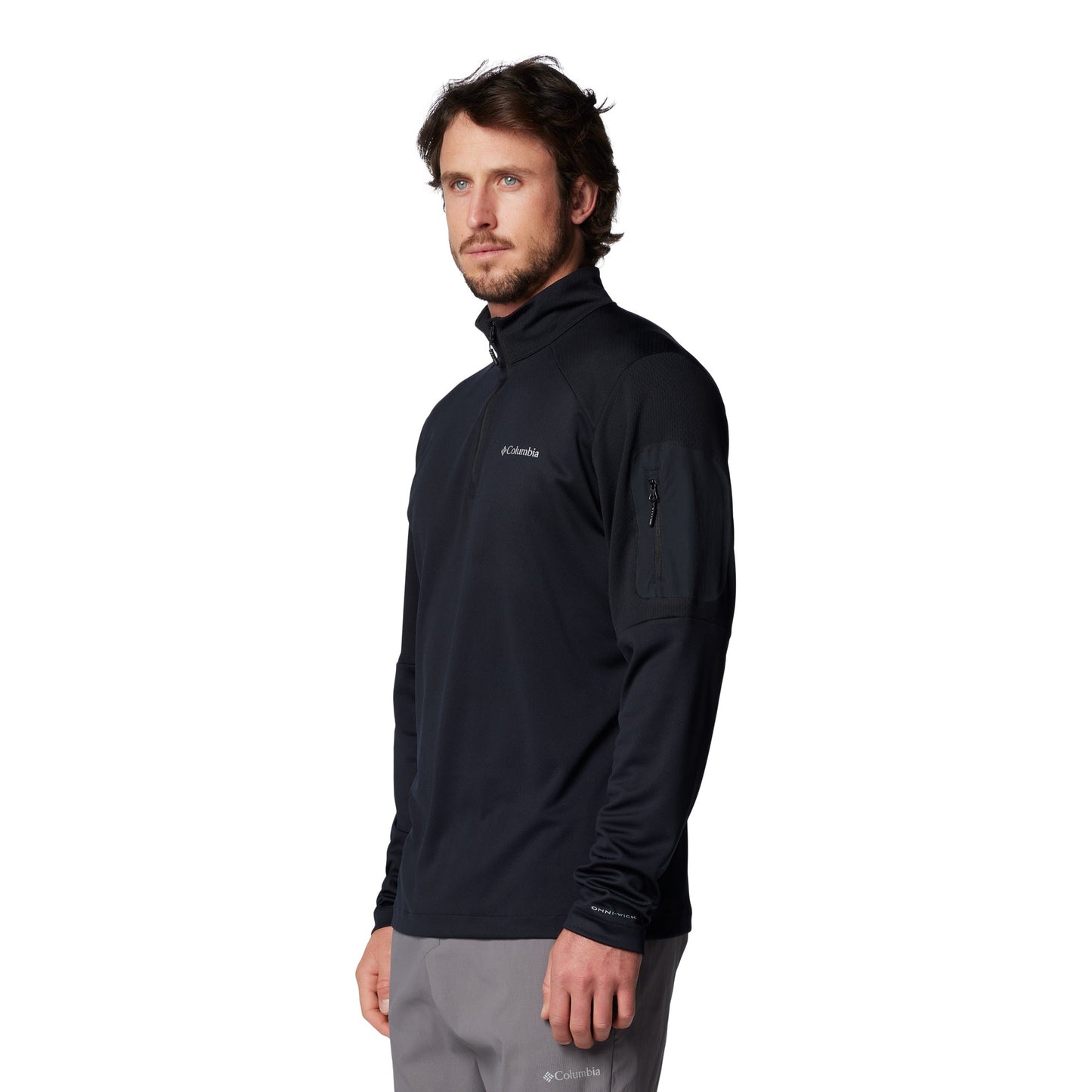 Man wearing Columbia Men's Columbia Tech™ Knit Quarter Zip Pullover in black, front angled view