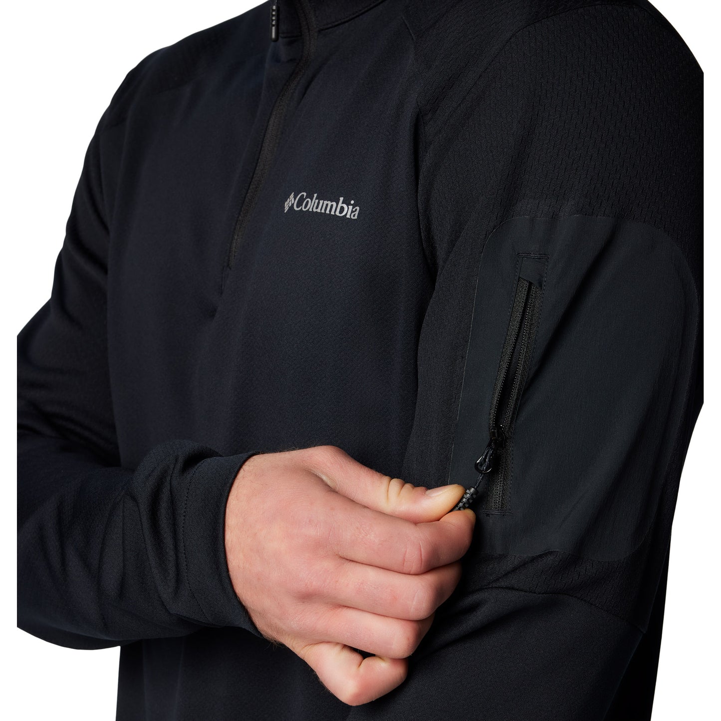 Close up of zipper pocket on left sleeve of black Columbia Men's Columbia Tech™ Knit Quarter Zip Pullover