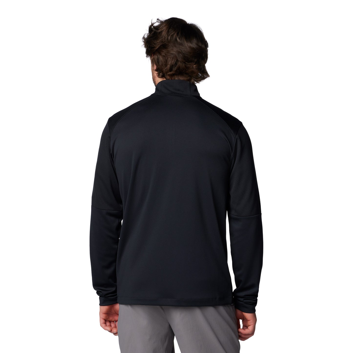 Man wearing Columbia Men's Columbia Tech™ Knit Quarter Zip Pullover in black, back view