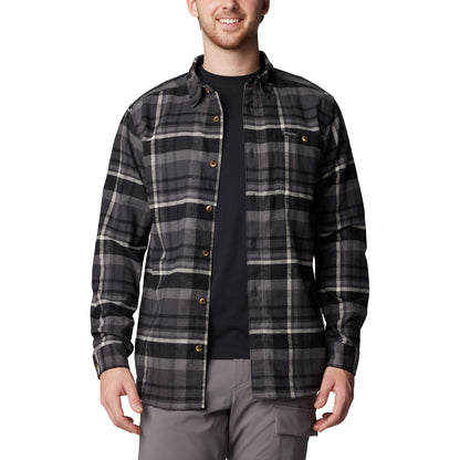 Man wearing Columbia Men's Pitchstone™ Heavyweight Flannel II in black multi plaid, black, grey, and white colour, front view, unbuttoned