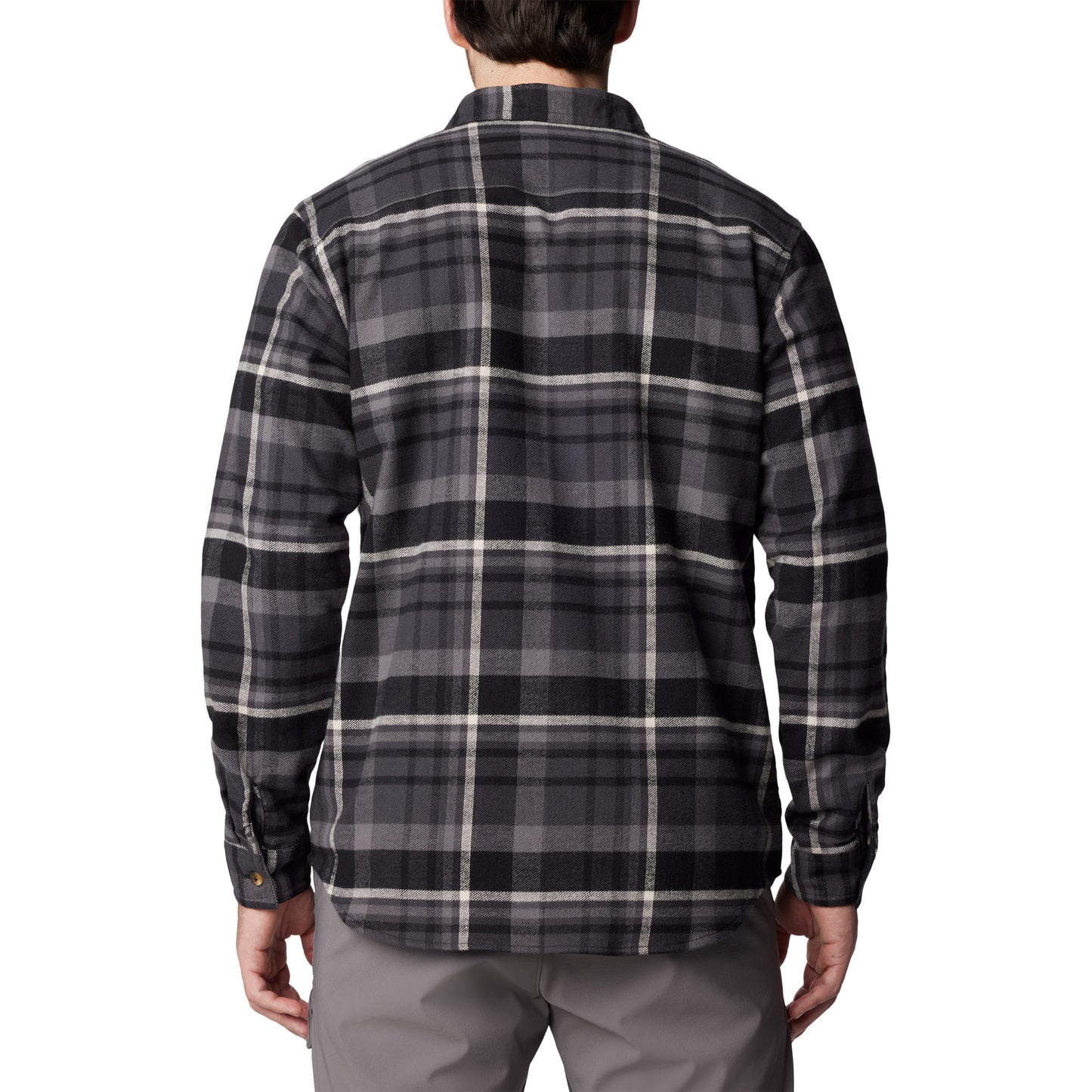 Man wearing Columbia Men's Pitchstone™ Heavyweight Flannel II in black multi plaid, black, grey, and white colour, back view