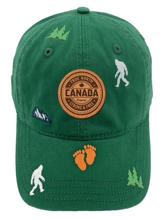 Product Image – Northern Icons Canada Mountain Yeti Embroidered Cap in green with Canada patch on front and embroidered yetis, footprints, trees and mountains all over.