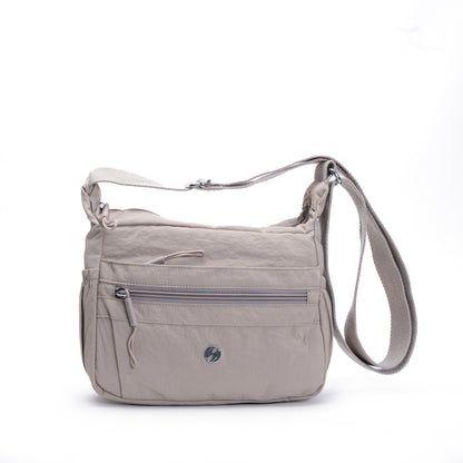Miss Caprice Multi-zip Small Hobo Crossbody—cream, adjustable strap, multi-pocket; great for travel.