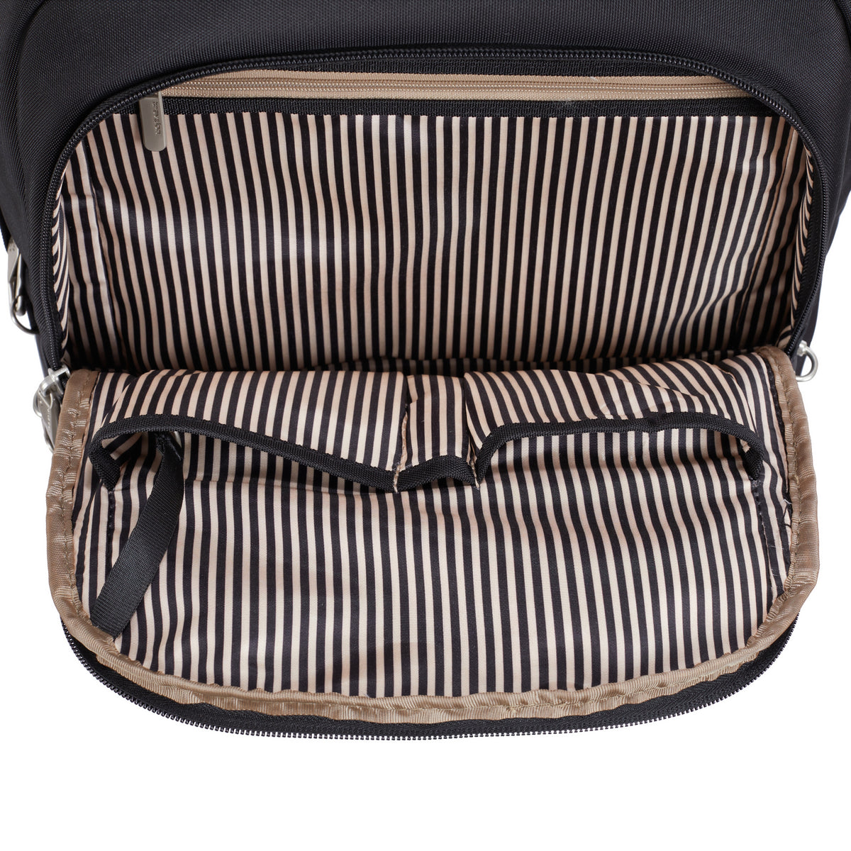 Open bag reveals striped lining, zip pocket, and RFID protection on the Travelon Anti-theft Heritage Backpack.