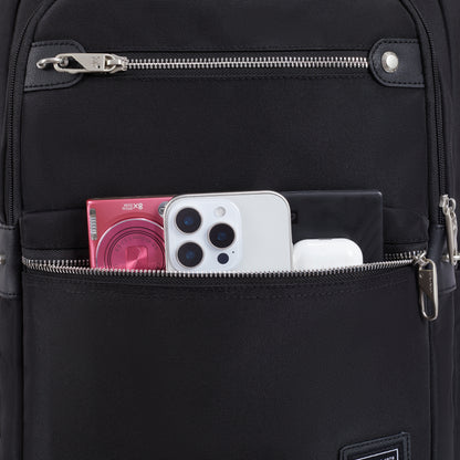 Travelon Anti-theft Heritage Backpack secures phone, camera & earbuds in its RFID blocking front pocket.
