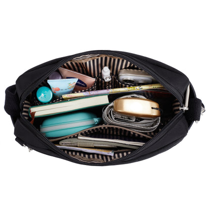 Organized tech carry in black with anti-theft security like the Travelon Anti-theft Heritage Crossbody.
