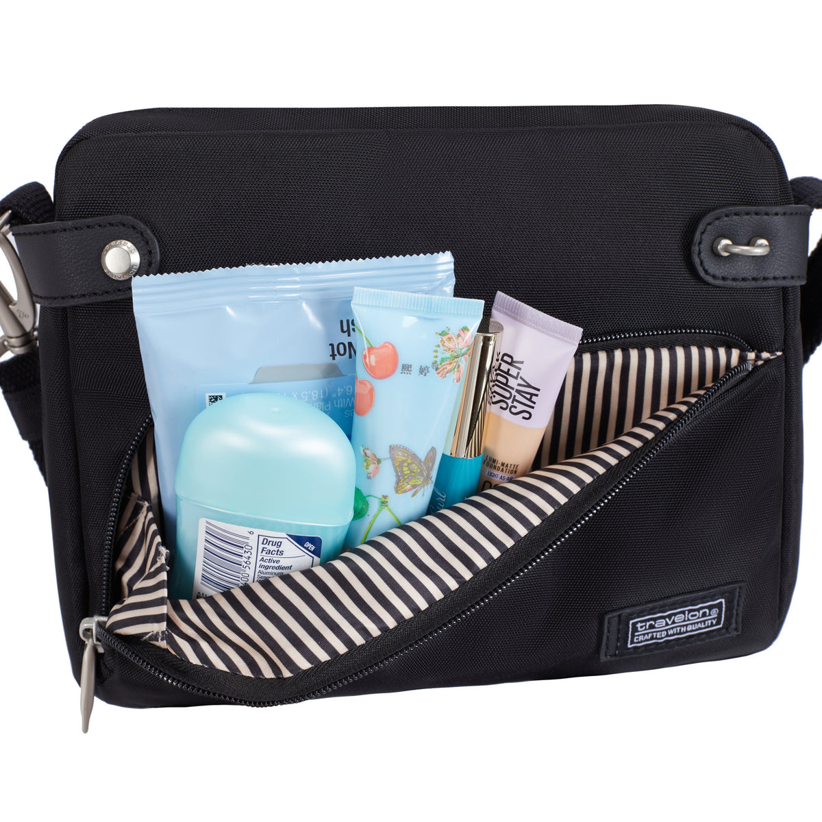 The Travelon Anti-theft Heritage Crossbody keeps items secure—perfect for travel. Shop online only.