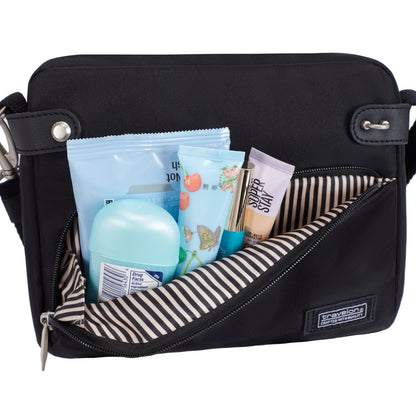 The Travelon Anti-theft Heritage Crossbody keeps items secure—perfect for travel. Shop online only.