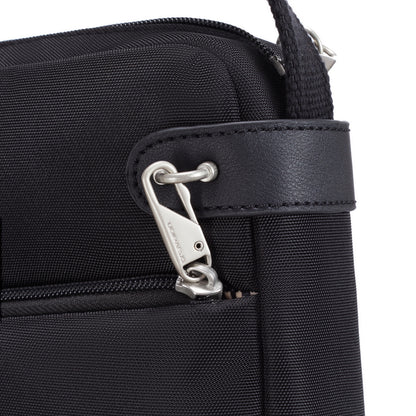 Close-up of Travelon Anti-theft Heritage Crossbody - ONLINE ONLY with black leather trim and security clasp.