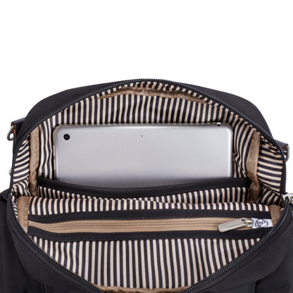 Open Travelon Anti-theft Heritage Tour Bag with striped lining, tablet, and zippered pouch inside.