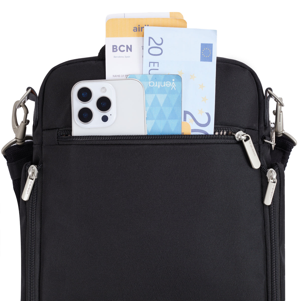 Travelon Anti-theft Heritage Tour Bag with a smartphone, Euros, and boarding pass in the outer zip pocket.