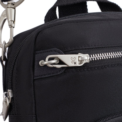 Close-up of the Travelon Anti-theft Heritage Tour Bag with silver zipper, metal clasp, and slash-resistant strap.