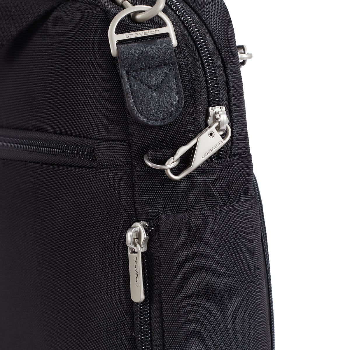 Travelon Anti-theft Heritage Tour Bag with secure zippers, leather strap, metal hardware & slash-resistant fabric.