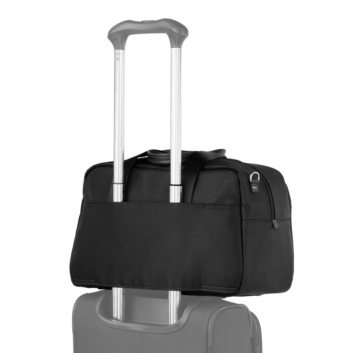 The Travelpro VersaPack+ UnderSeat Tote attaches to a suitcase handle with its back strap for easy travel.