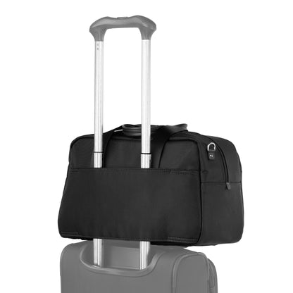 The Travelpro VersaPack+ UnderSeat Tote attaches to a suitcase handle with its back strap for easy travel.