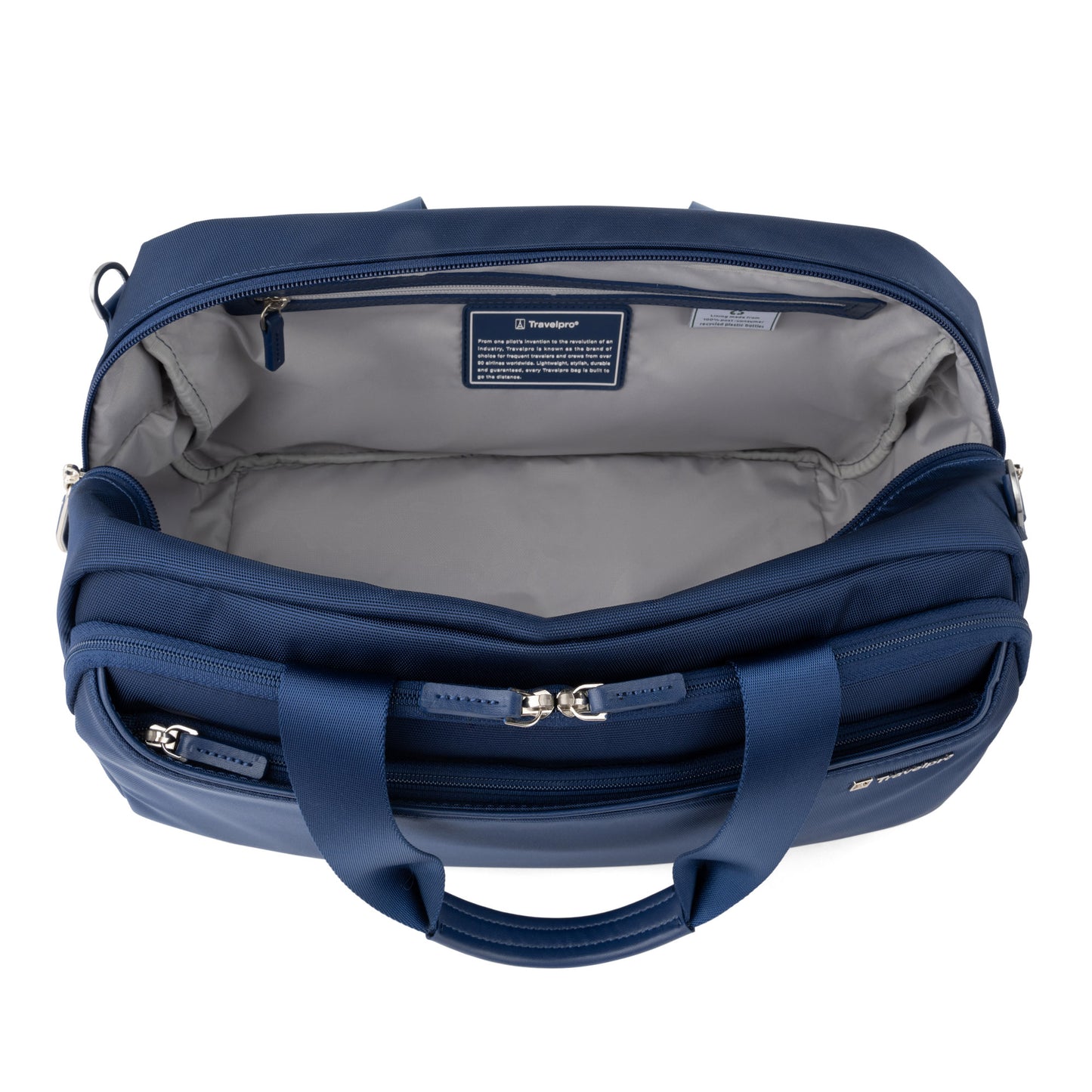 The Travelpro VersaPack+ UnderSeat Tote features a blue exterior, open main compartment, and zippered front pocket.
