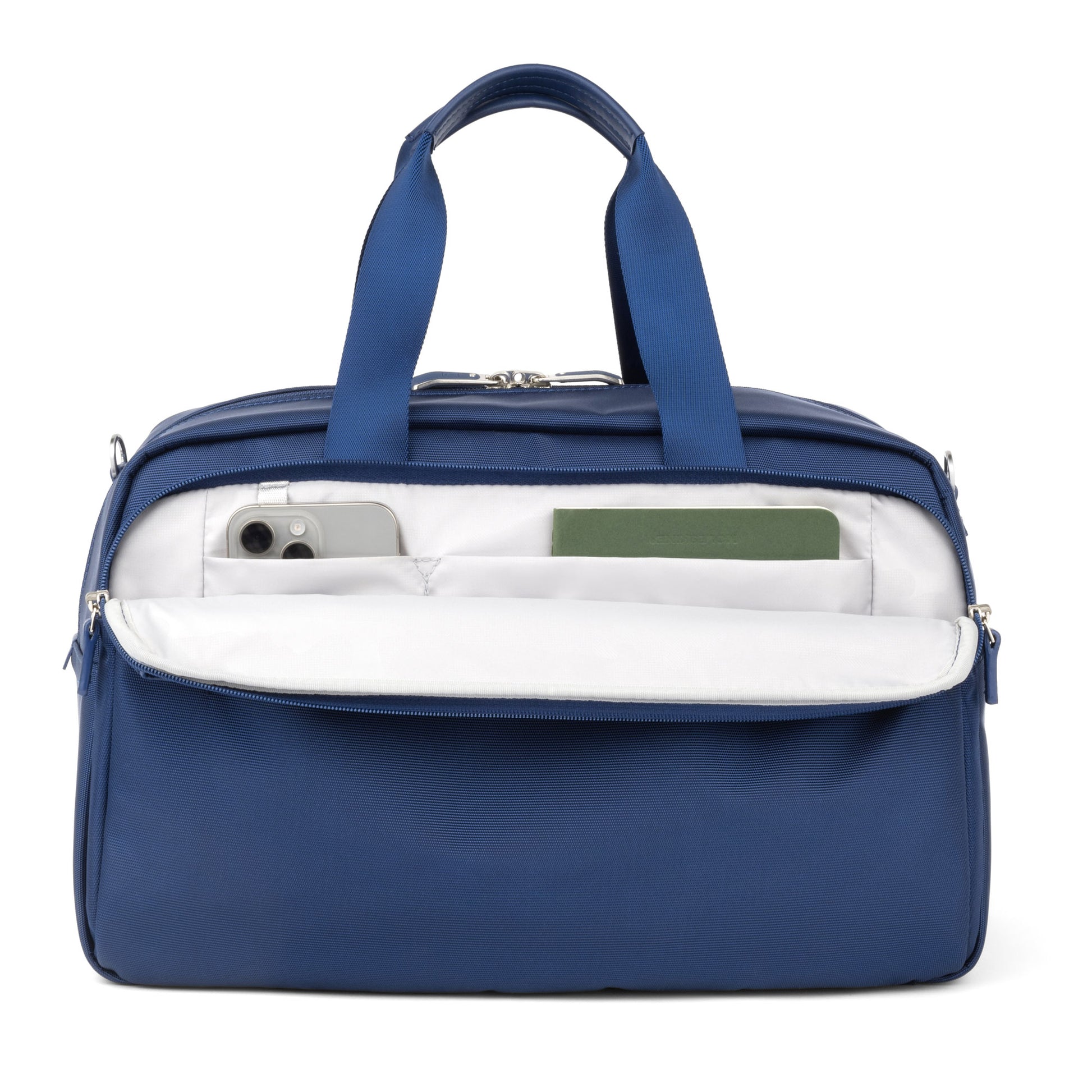 The Travelpro® VersaPack®+ UnderSeat Tote in blue has an open pocket showing a smartphone and green notebook.