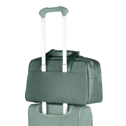 The Travelpro® VersaPack®+ UnderSeat Tote secures to luggage handles with a built-in sleeve for easy travel.
