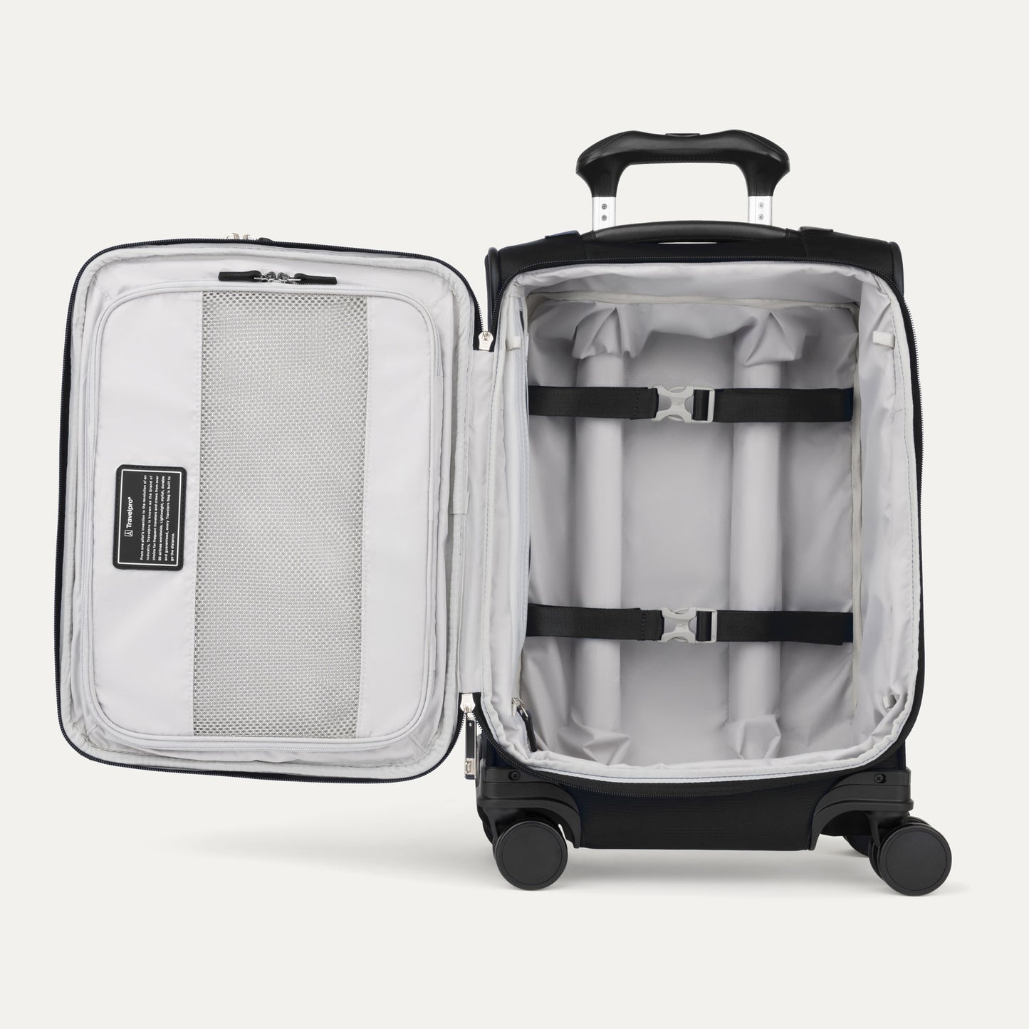 Travelpro® VersaPack®+ black carry-on spinner: expandable, gray interior, mesh pocket, straps, 4 wheels.