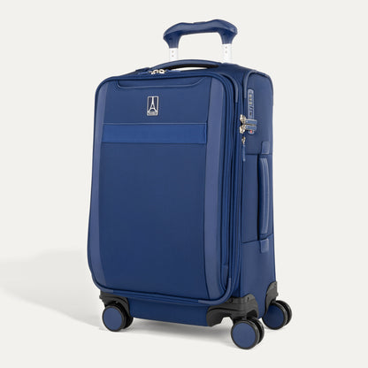Travelpro VersaPack+ blue carry-on spinner with 4 wheels, TSA lock, and retractable handle on white background.