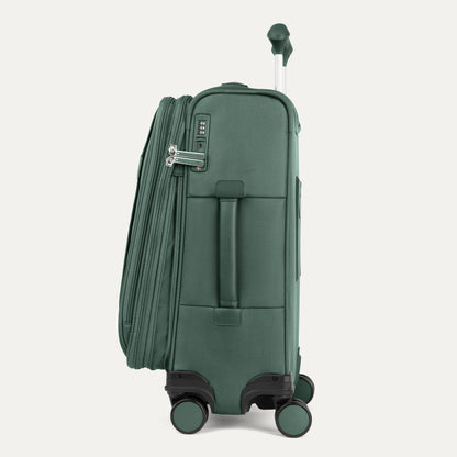Travelpro® VersaPack®+ Carry-on Expandable Spinner, green, shown from the side with extended handle.