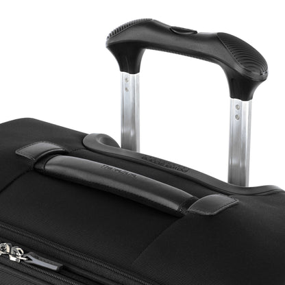 Close-up of the Travelpro® VersaPack®+ Medium Check-in Spinner with retractable handle and TSA lock visible.