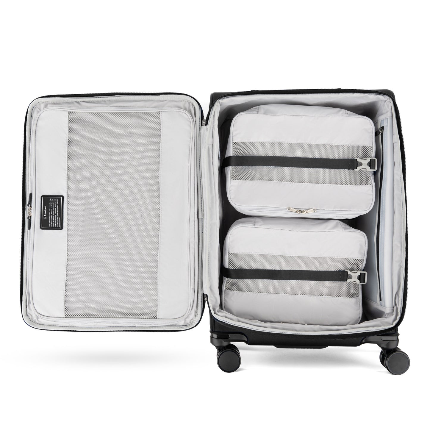Inside the Travelpro® VersaPack®+ Spinner are 3 white packing cubes, a mesh pocket, and water-resistant lining.