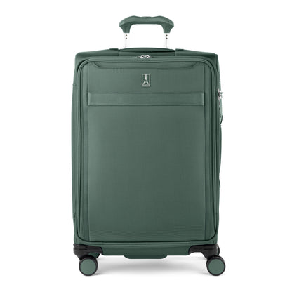 Travelpro VersaPack+ Medium green expandable spinner with water-resistant lining and wheels.