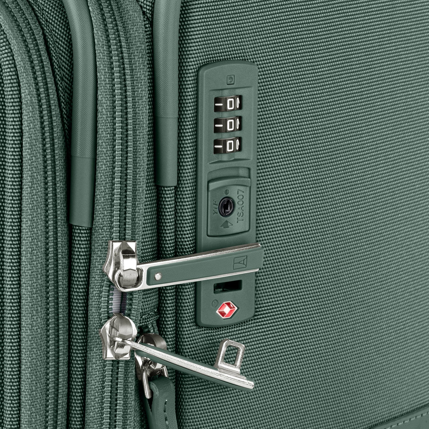 Close-up of the Travelpro VersaPack+ Medium Check-in Spinner with TSA lock and secured zippers.