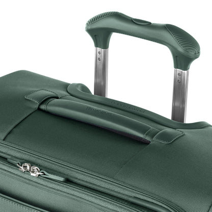 Close-up of Travelpro® VersaPack®+ green medium check-in expandable spinner with extended handle and water-resistant lining.