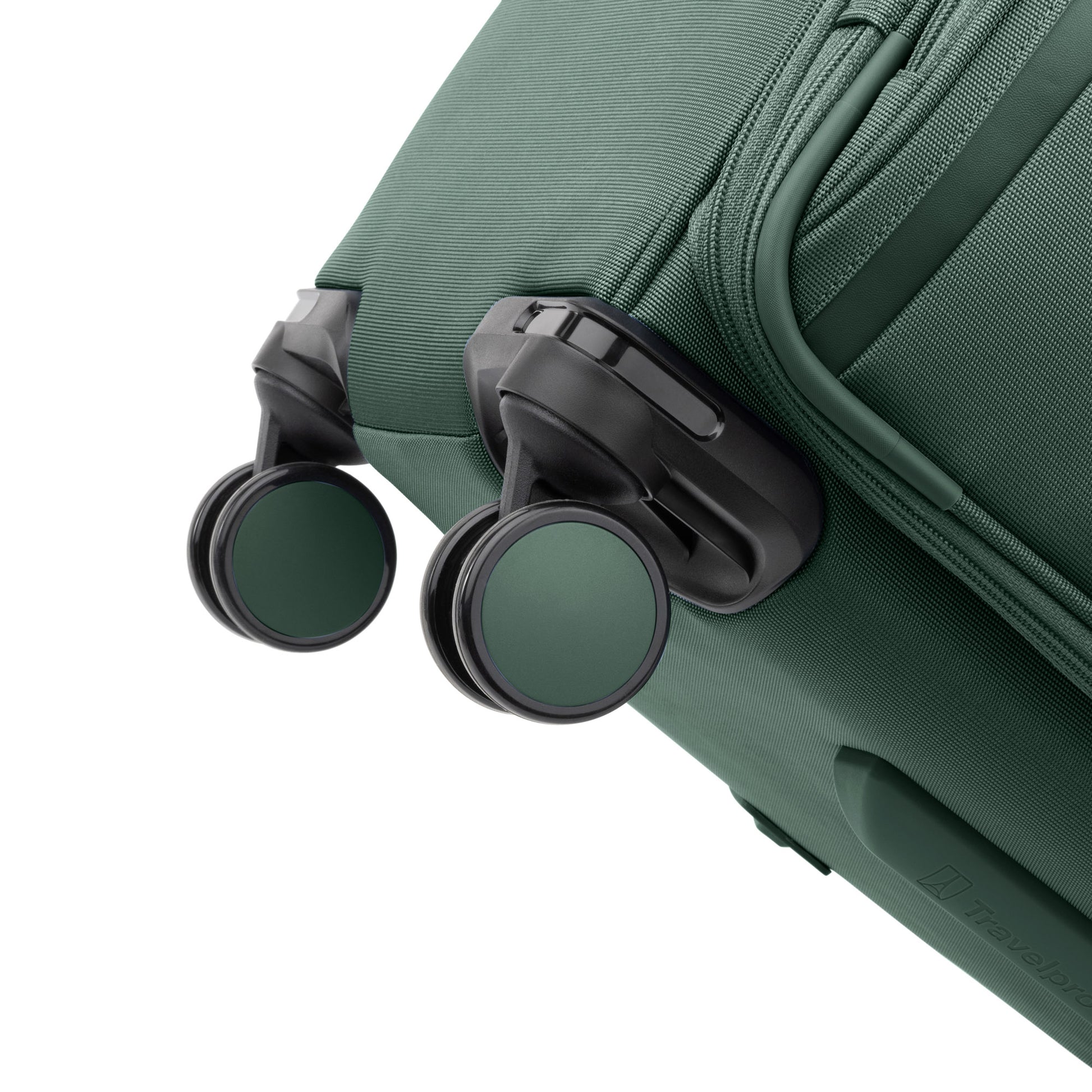 Close-up of black and green wheels on the Travelpro® VersaPack®+ Large Check-in Expandable Spinner.