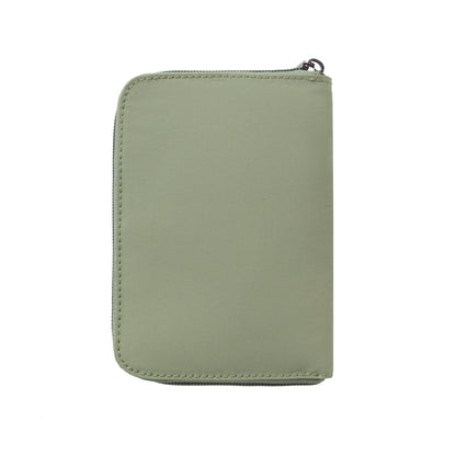 A closed Travelon RFID Blocking Family Passport Wallet in light green is shown on a plain white background.