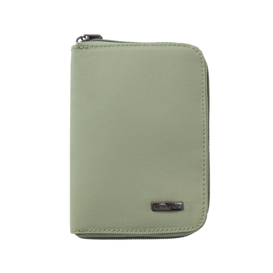 Product Image – Light green Travelon RFID Blocking Family Passport Wallet with metal logo, shown on a white background.