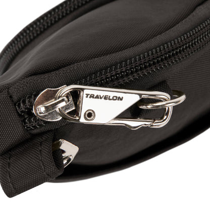 Close-up of Travelon Anti-theft Essentials Mini Asymmetric Crossbody zipper with locking detail.