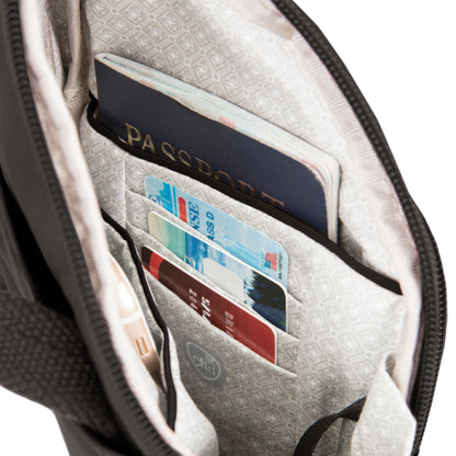 Travelon Anti-theft Essentials Mini Asymmetric Crossbody keeps passport and cards safe in slash-resistant pockets.
