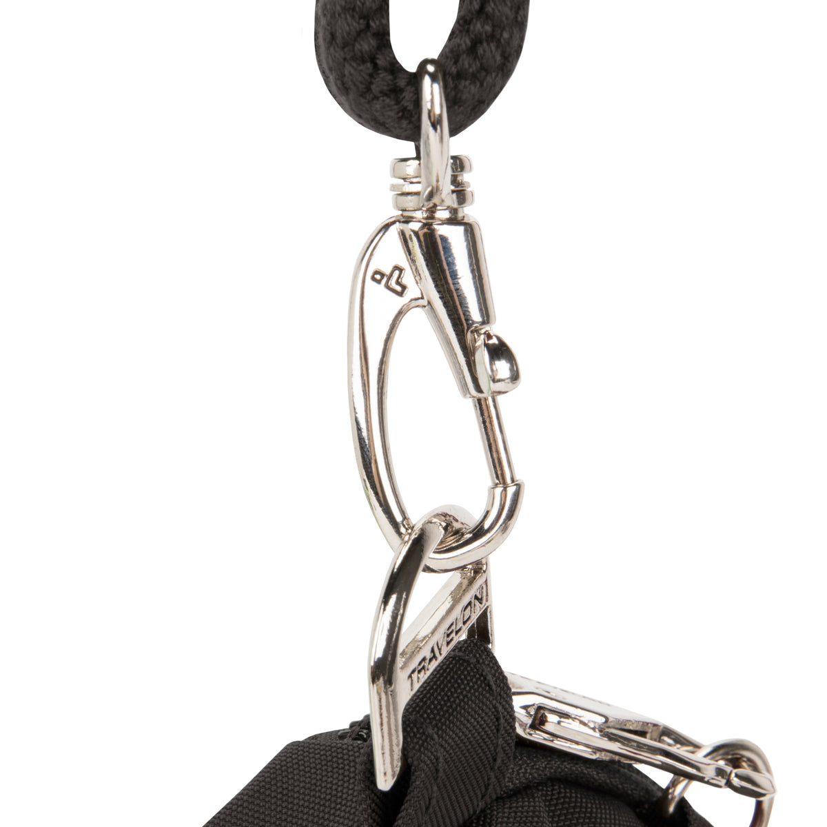 Close-up of a carabiner on the Travelon Anti-theft Essentials Mini Asymmetric Crossbody, attached to rope.