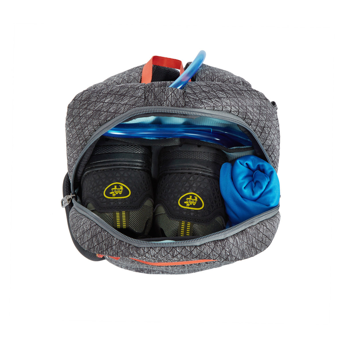 Open Travelon backpack with hiking boots, blue shirt, RFID organizer, and blue water bladder tube.