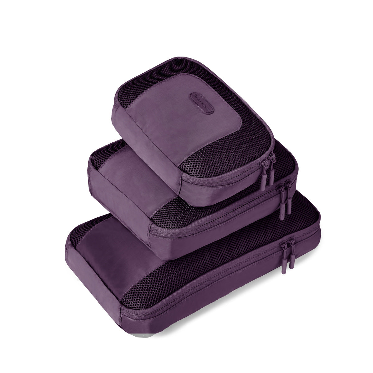 Travelon Pi Never Lost Set of 3 Packing Cubes, small, medium and large stacked in blackberry purple colour