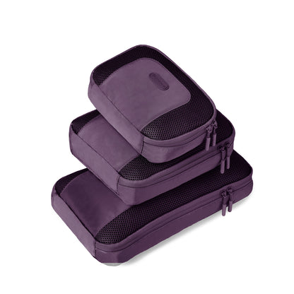 Travelon Pi Never Lost Set of 3 Packing Cubes, small, medium and large stacked in blackberry purple colour