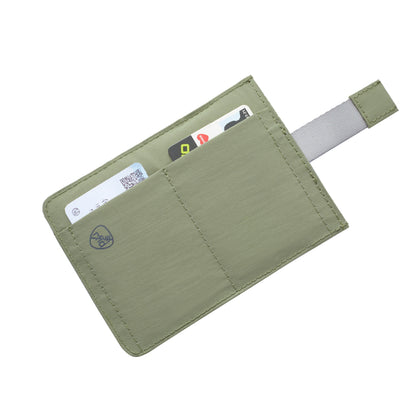 Travelon RFID Blocking Pull-Up Passport Holder by Travelon, green fabric with gray pull tab, holds two cards.