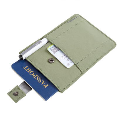 The Travelon RFID Blocking Pull-Up Passport Holder securely holds a passport, pen, and card in its pocket.