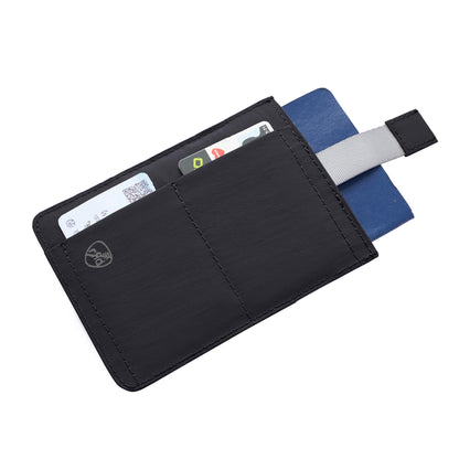 Travelon RFID Blocking Pull-Up Passport Holder securely holds cards and a passport, with a grey pull tab.
