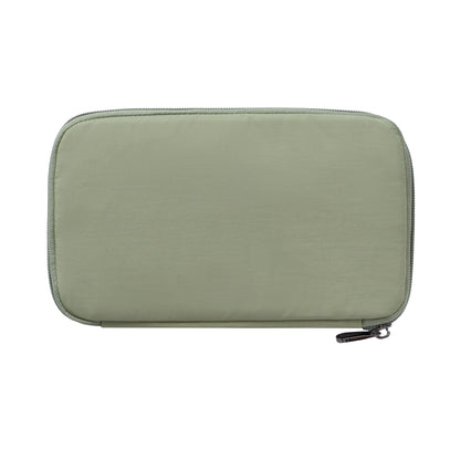 Travelon RFID Blocking Family Passport Wallet in light green, rectangular, smooth surface, white background.