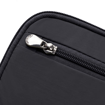 Close-up of the Travelon RFID Blocking Zip Passport Wallet with a silver zipper and "TRAVELON" pull tab.