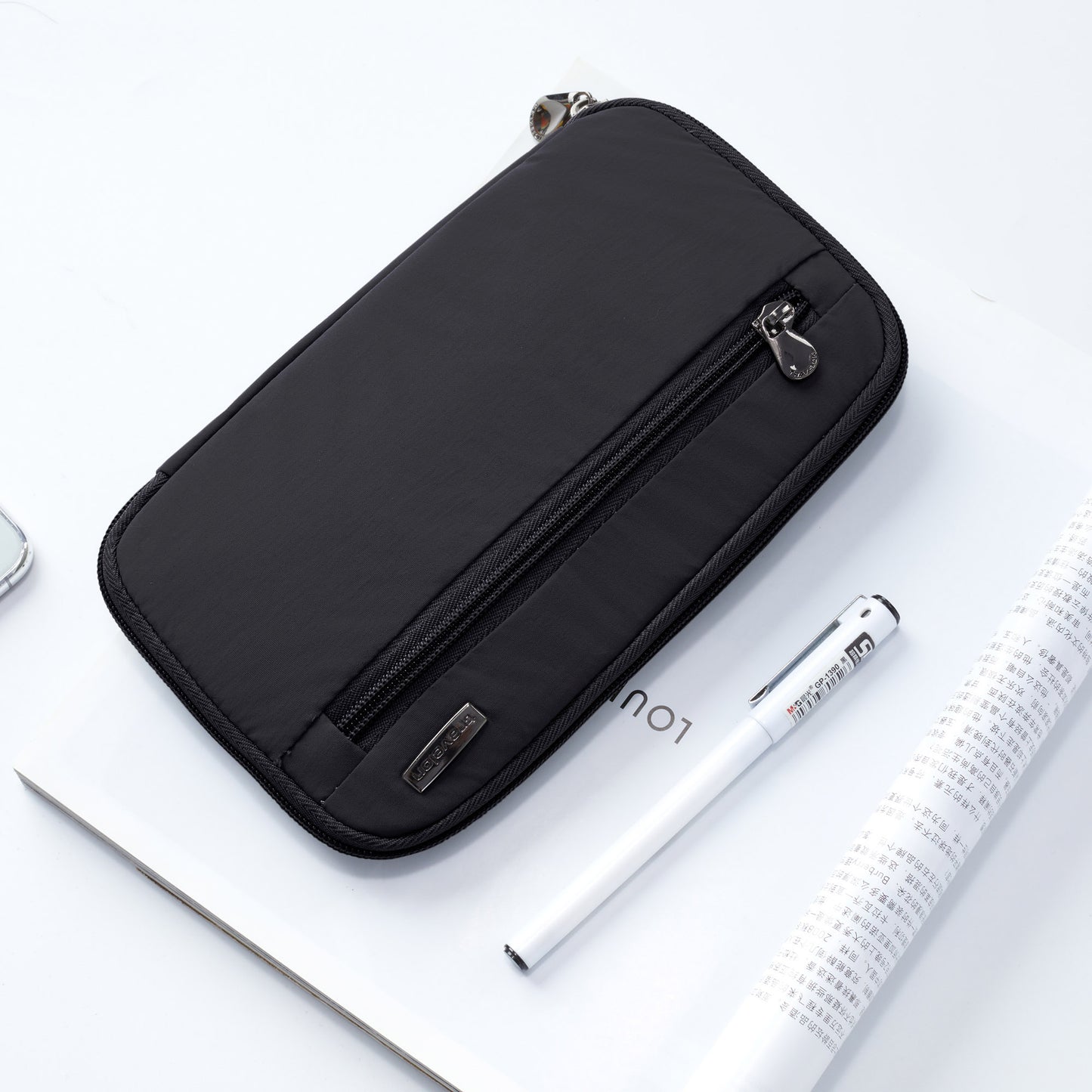 The Travelon RFID Blocking Family Passport Wallet keeps your essentials secure—perfect for travel.