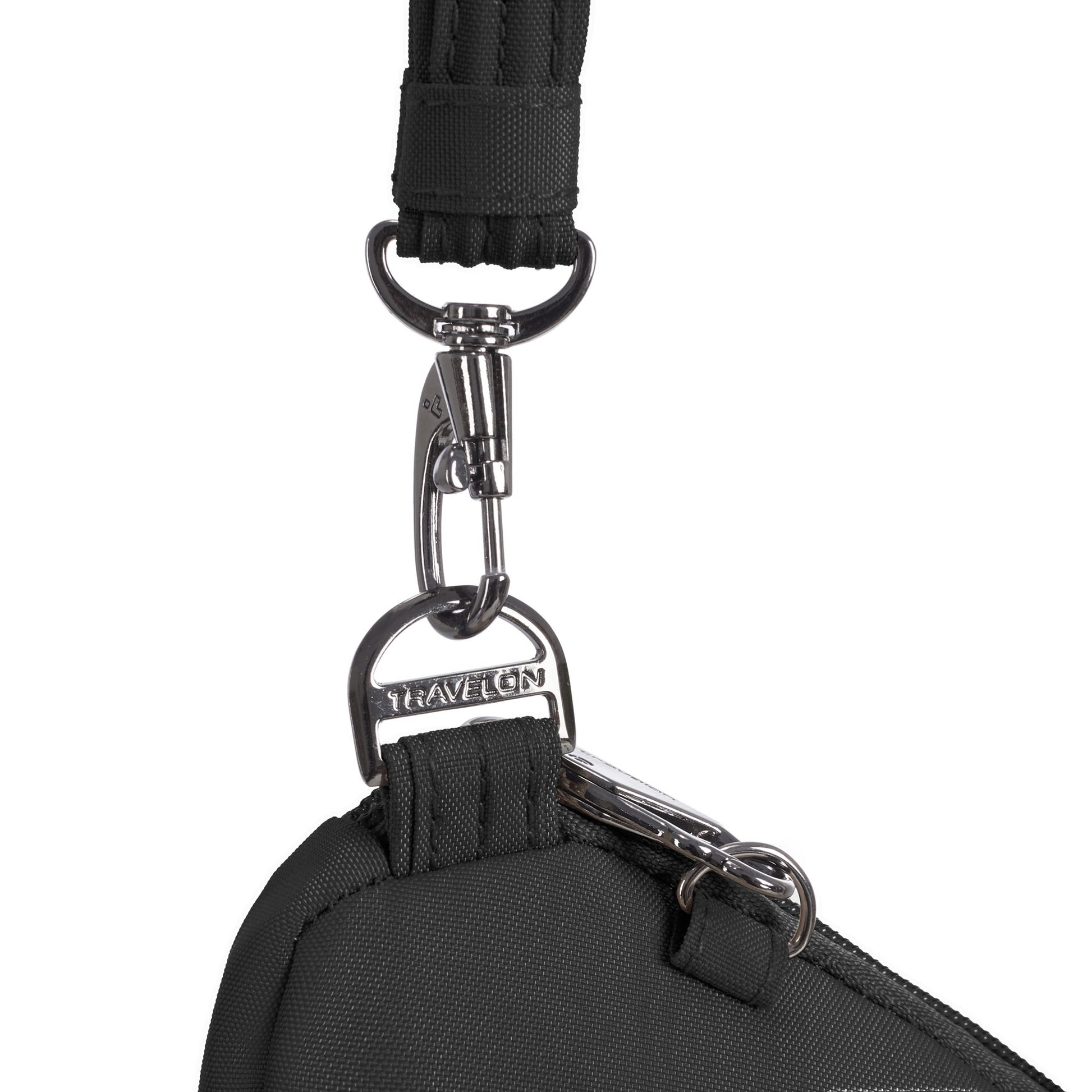 Close-up of the Travelon Runways Anti-theft Slim Asymmetric Crossbody's strap with clasp and branded ring.